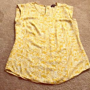 This is a Yellow patterned blouse